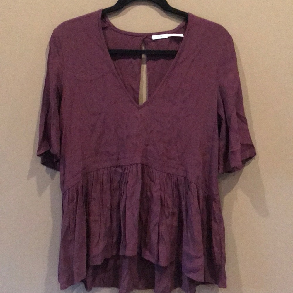 Kimichi Blue size S deep purple top.